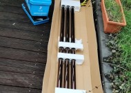 热水器垂下来一根管子的处理方法（解决热水器垂下来的管子问题的实用方法）