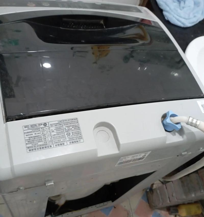 小天鹅洗衣机门打不开怎么办？（解决小天鹅洗衣机门打不开的问题）  第3张